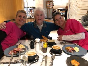 Dreams project with elderly lady and nurse caregiver having breakfast