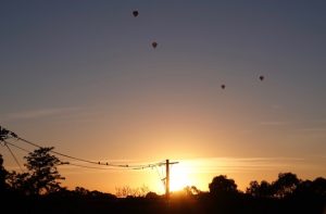 Dreams project with elderly lady and nurse caregiver sunrise in a balloon