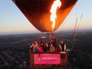 Dreams project with elderly lady and nurse caregiver group photo in balloon